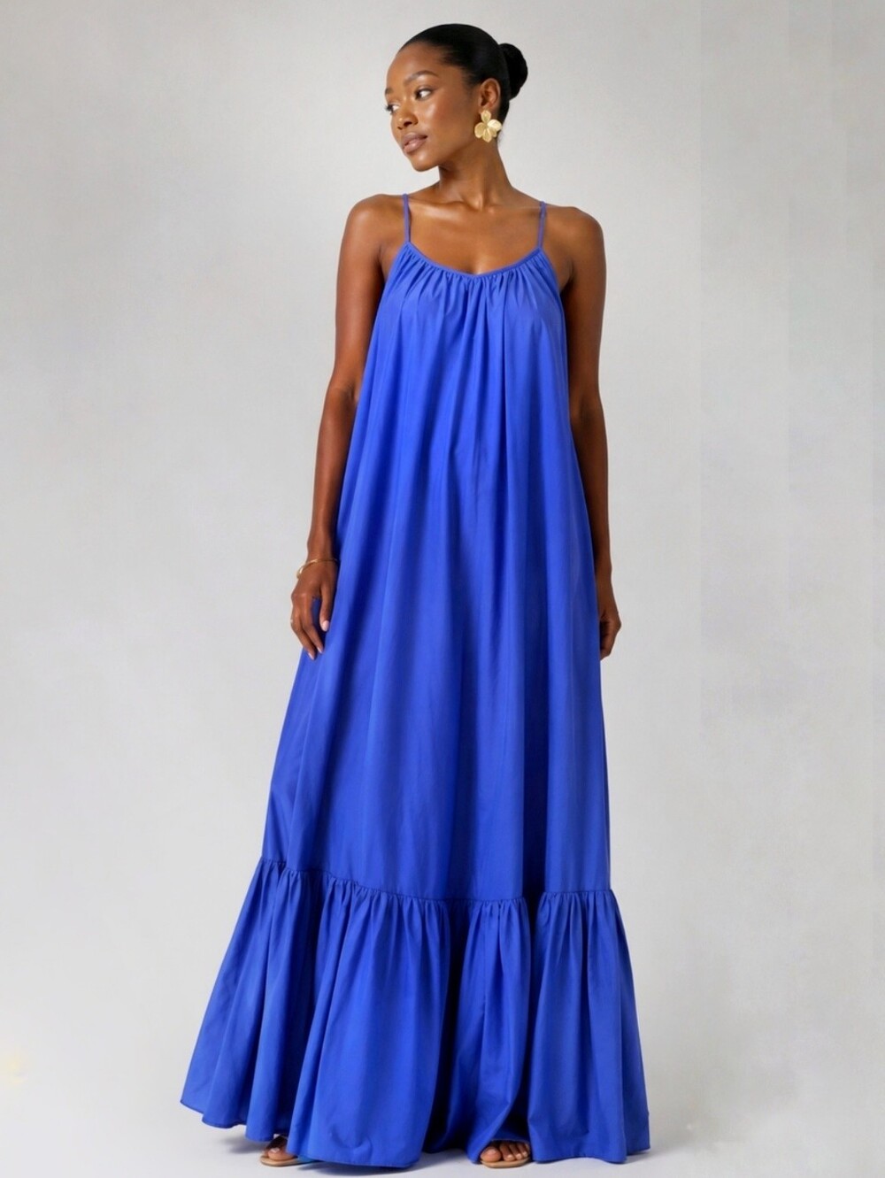 Spaghetti Strap Sleeveless Ruched Ruffle Hem. Runs big  due to the style.